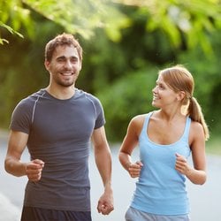 Ups Energy & Metabolism – Young couple jogging at a park