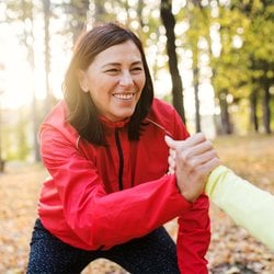 Protects DNA Integrity – Woman doing partner exercises at a park