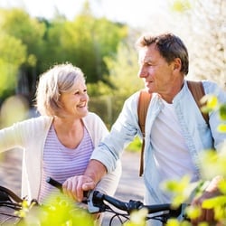 A couple bike riding