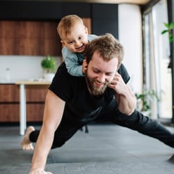a father playing with his child