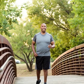 Beat Fatigue – Man jogging on a bridge