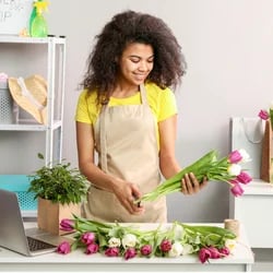 Someone picking fresh flowers