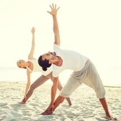 A couple doing yoga