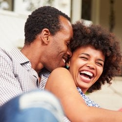 Boosts Sexual Health – Happy, smiling couple in a warm embrace